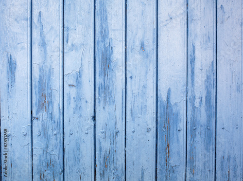 old wooden background in light blue color