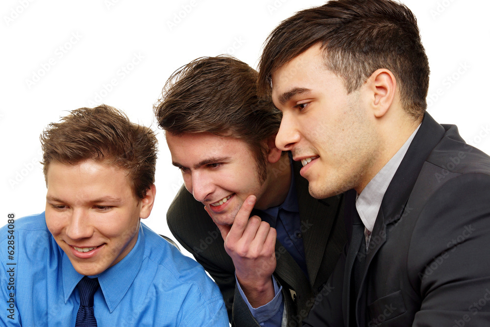 Portrait closeup of three young business people discussing Portrait closeup of three young business people discussing