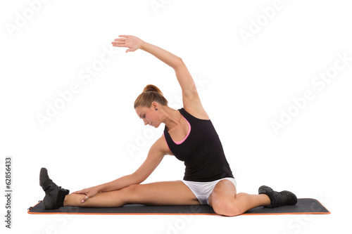Attractive Young Fitness Instructor Shows Stretching On Aerobic.