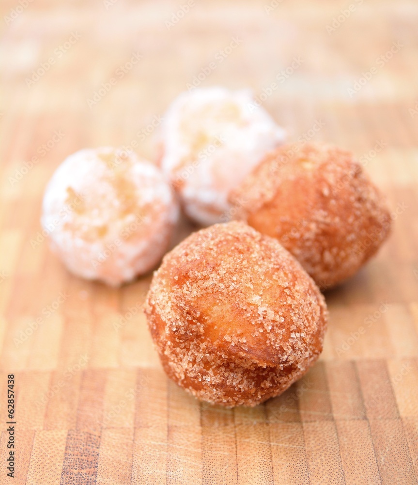 Fresh fried donuts powdered by a sugar. Fresh fried donuts powdered by a sugar.