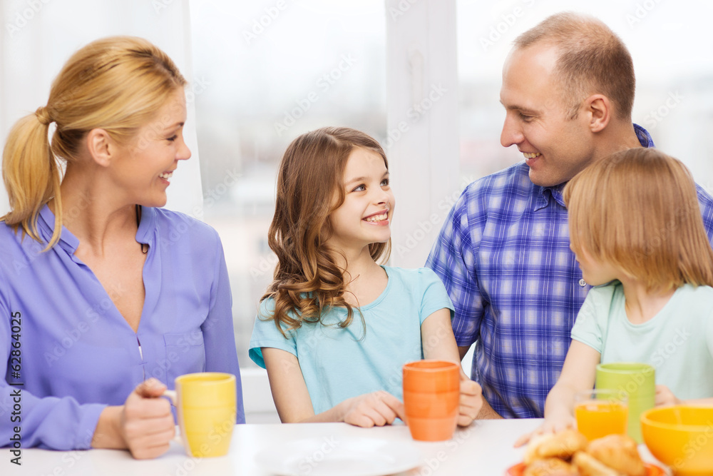 happy family with two kids with having breakfast happy family with two kids with having breakfast