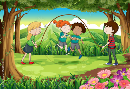 Children playing with the rope at the jungle
