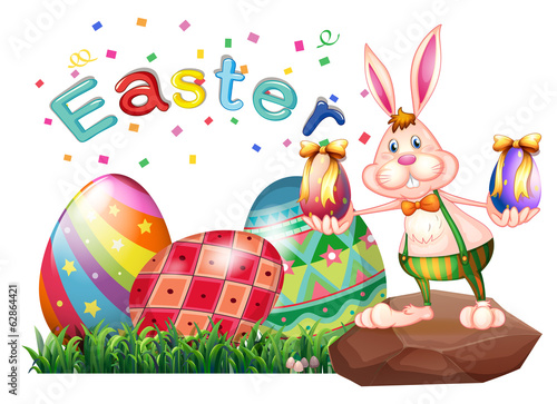 A bunny above the rock with Easter eggs