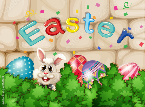 A bunny hiding with Easter eggs