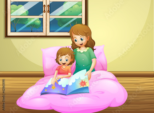 A mother reading with her daughter