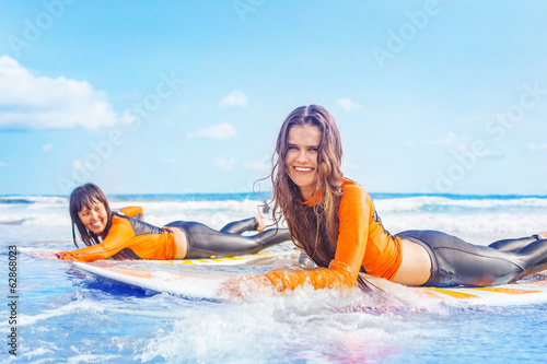 Surfer girls in Bali