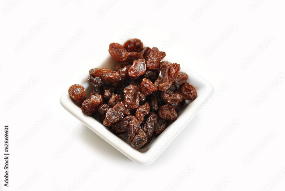 A Healthy Treat of Dried Raisins in a Square Bowl
