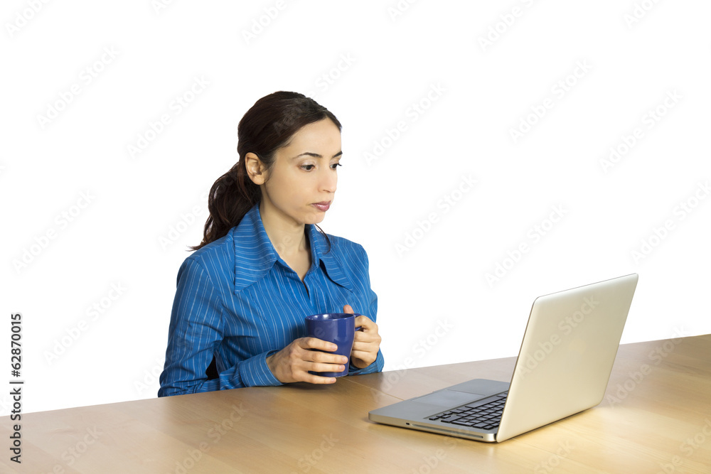 Business woman looking at her computer Business woman looking at her computer