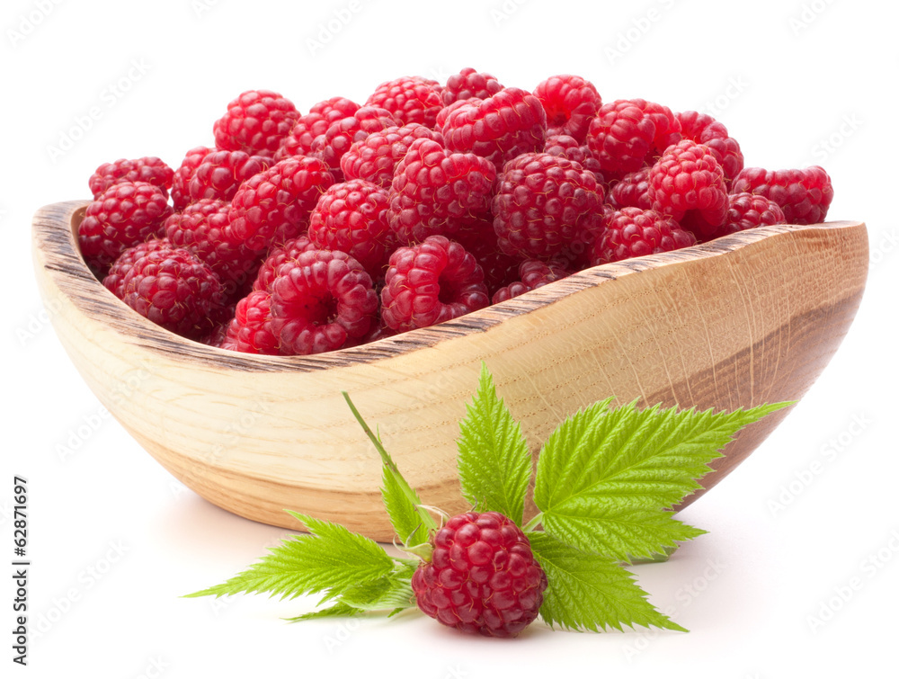 raspberries in wooden bowl raspberries in wooden bowl