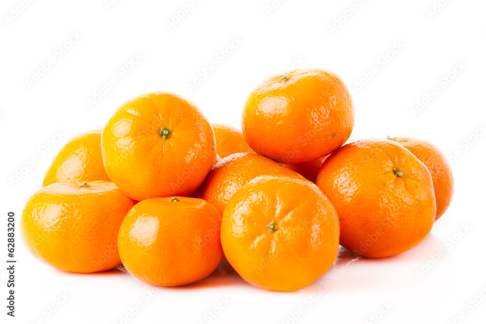 ripe juicy tangerine on a white background. Clementine Mandarin ripe juicy tangerine on a white background. Clementine Mandarin