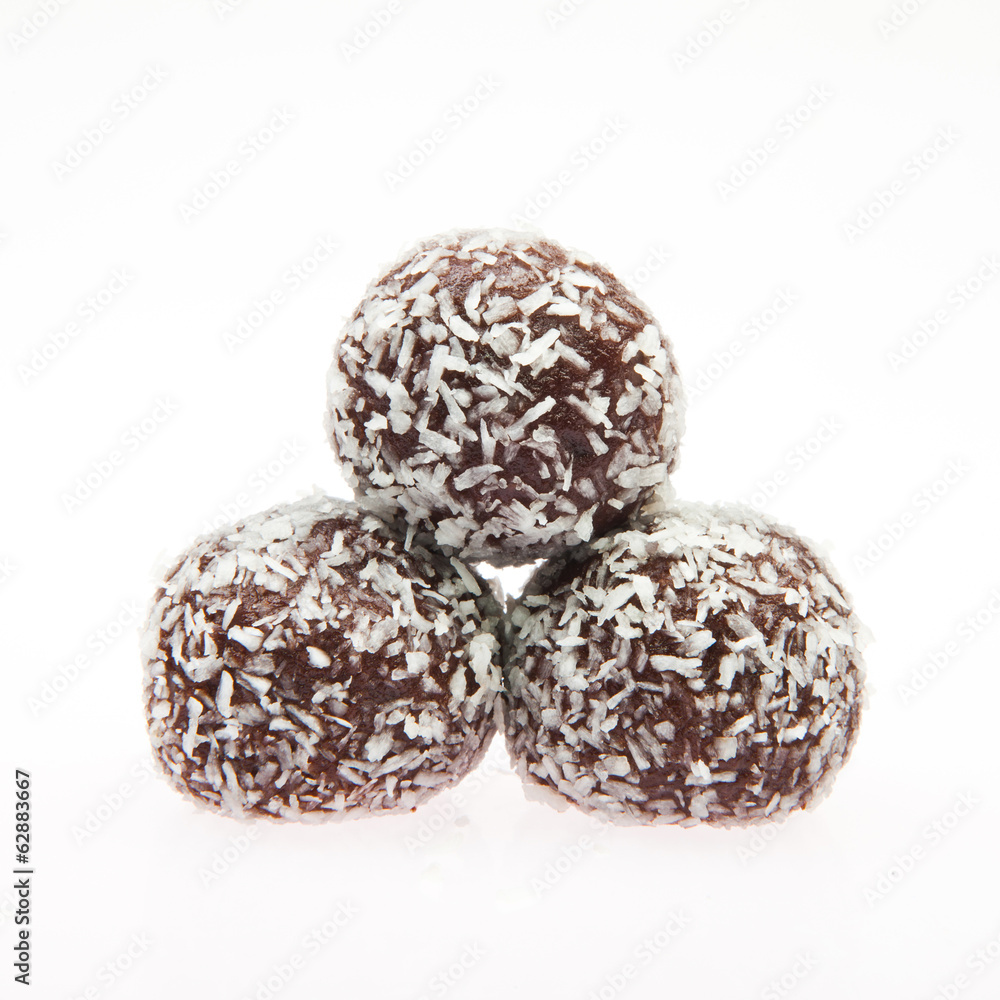 Stack of Chocolate balls with coconut flakes Stack of Chocolate balls with coconut flakes