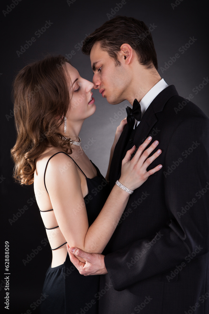 Side View Of Couple Kissing