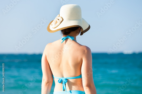 Woman Enjoying The Ocean View At Beach