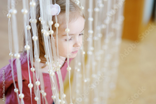 Fototapeta Naklejka Na Ścianę i Meble -  Adorable little girl portrait indoors