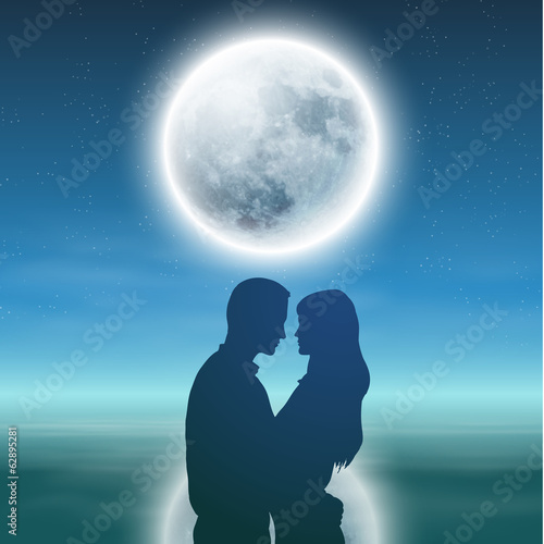 Sea with full moon and silhouette couple at night.