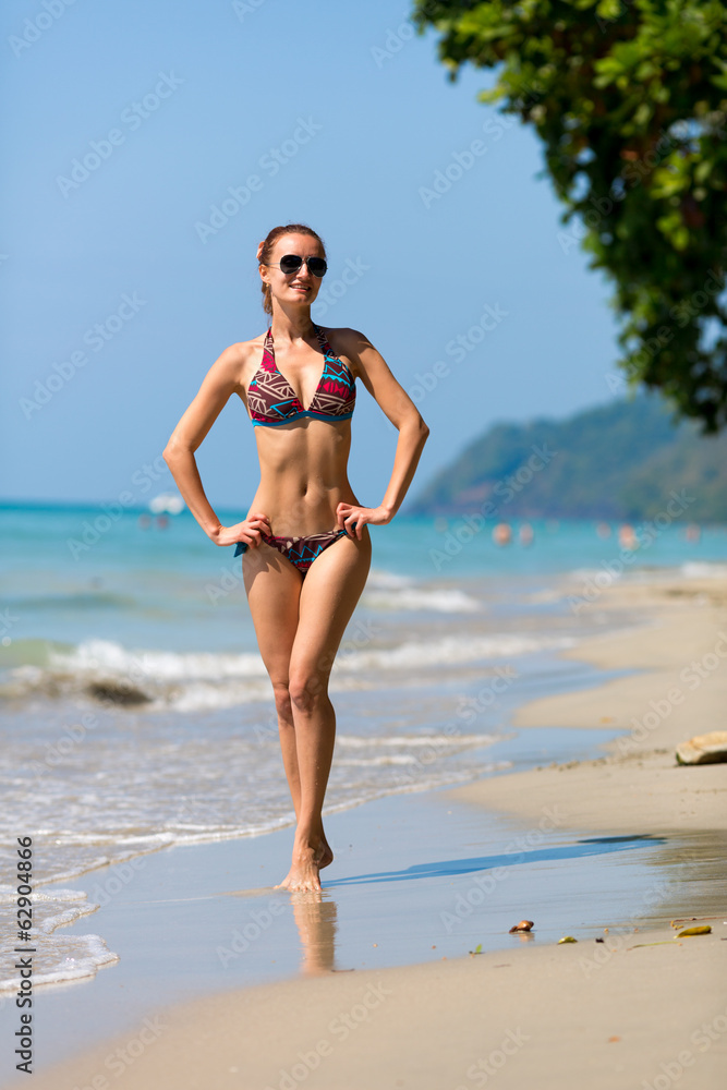 Sexy women sunbathing in Thailand vertical image Sexy women sunbathing in Thailand vertical image