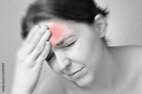 Young woman having migraine photo