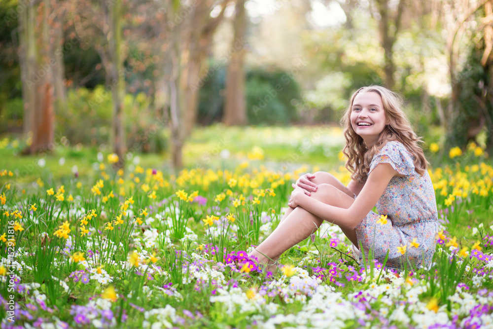 Beautiful young girl in forest on a spring day Beautiful young girl in forest on a spring day