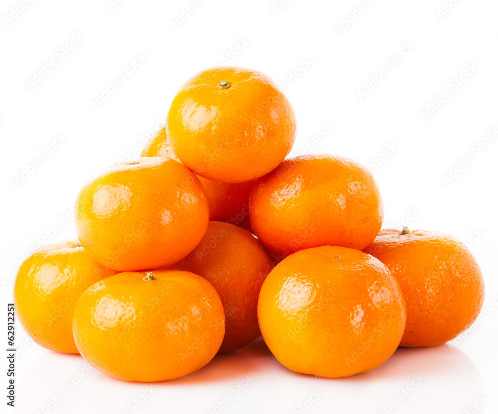ripe juicy tangerine on a white background. Clementine Mandarin ripe juicy tangerine on a white background. Clementine Mandarin