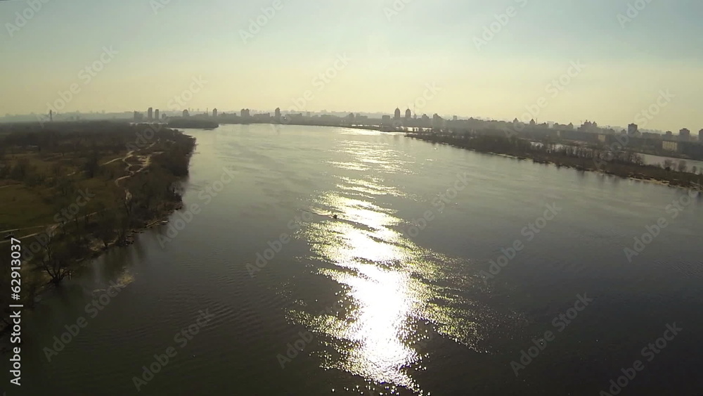 Evening landscape with sun reflections. River Dnepr, Ukraine. Evening landscape with sun reflections. River Dnepr, Ukraine.