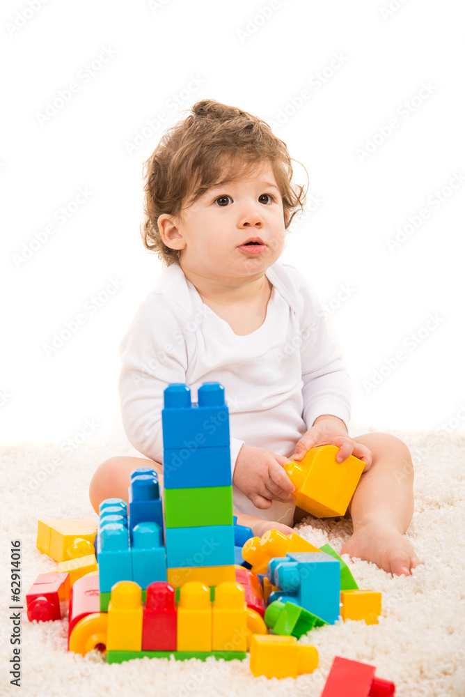 Baby boy playing with building blocks Baby boy playing with building blocks