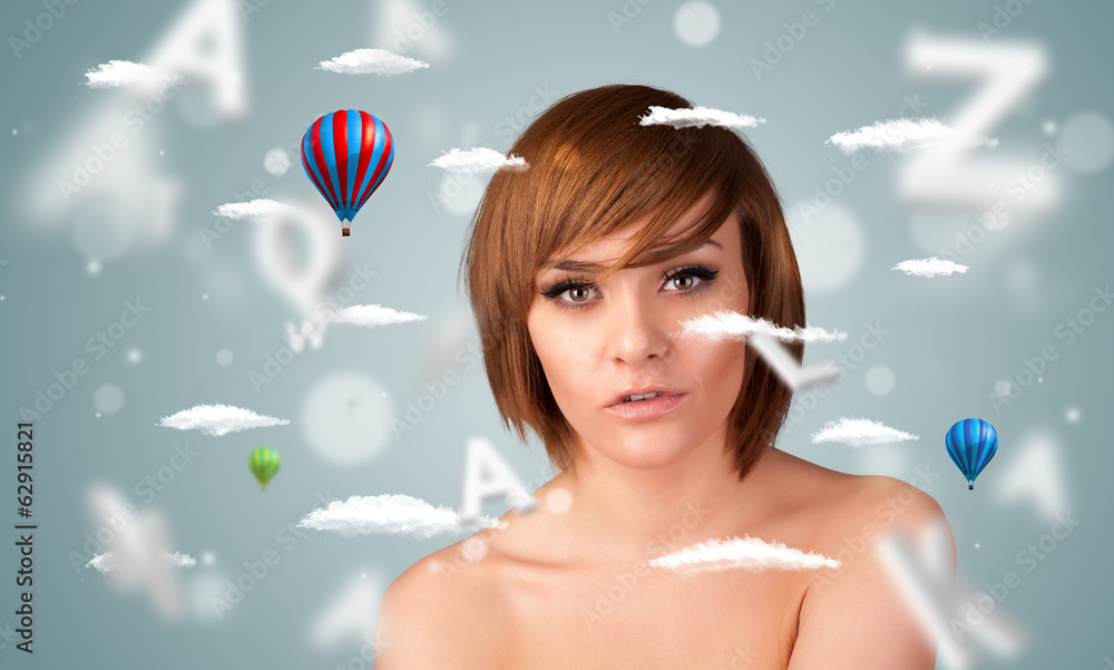 Beautiful young woman with wellness and healthcare clouds Beautiful young woman with wellness and healthcare clouds