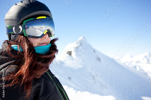 Woman on summit in alps