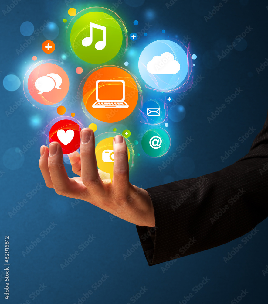 Multimedia icons in the hand of a businessman Multimedia icons in the hand of a businessman