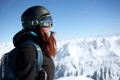 Woman on summit in alps