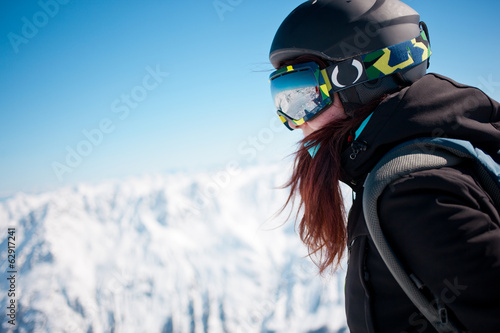 Woman on summit in alps