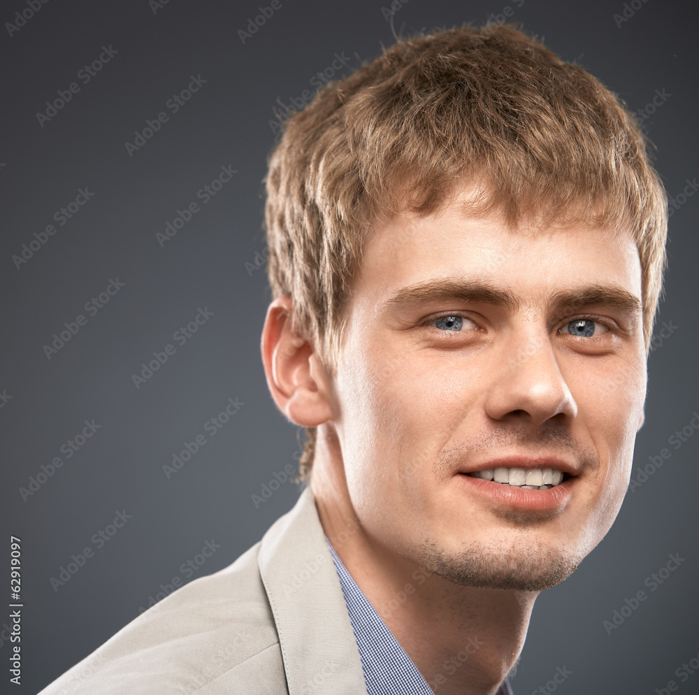 Obraz premium Businessman isolated studio portrait on gray