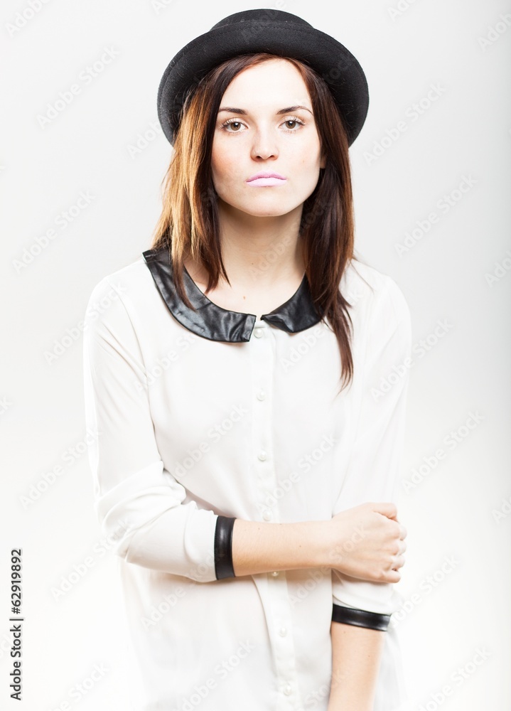 Fashion portrait of young woman in hat Fashion portrait of young woman in hat