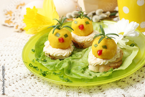 easter breakfast. Chickens made from egg yolk with mayonnaise pu © Alina G