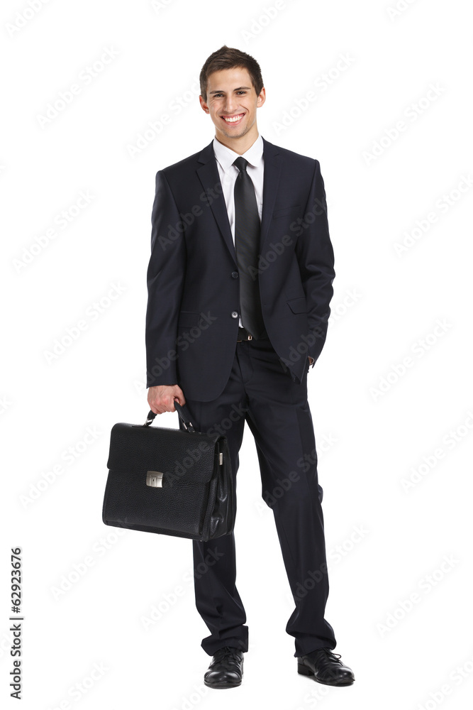 Full-length portrait of businessman handing briefcase, isolated Full-length portrait of businessman handing briefcase, isolated