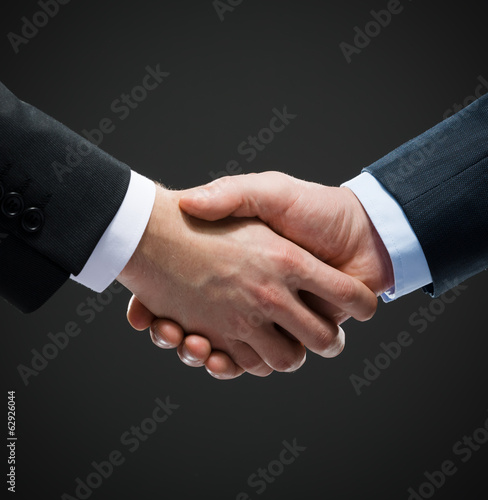 Close up shot of hand shake of business people