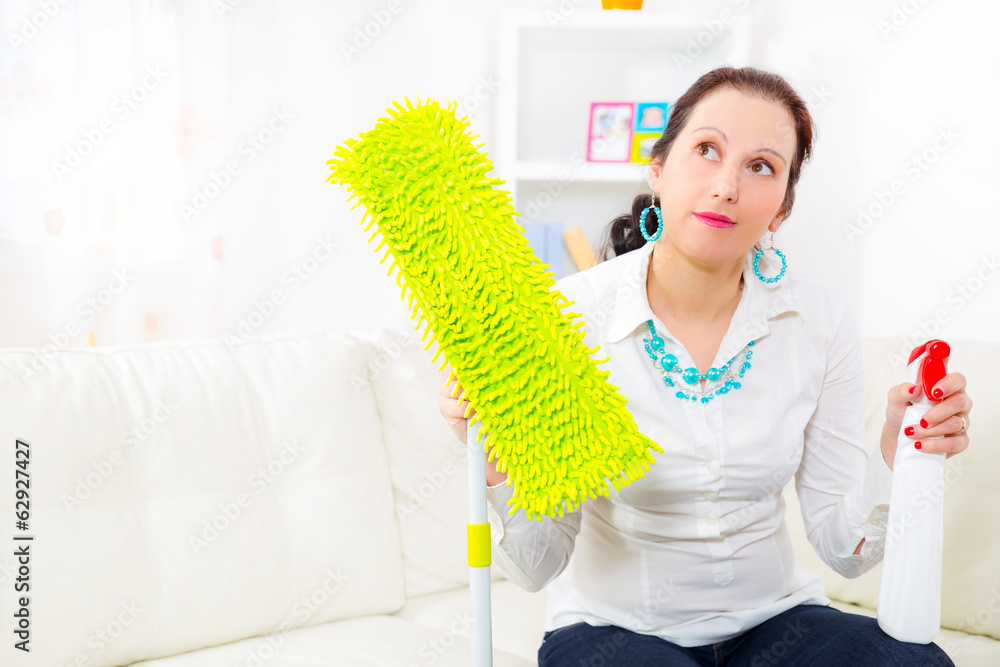 Dress up housewife with spray bottle and mop Dress up housewife with spray bottle and mop