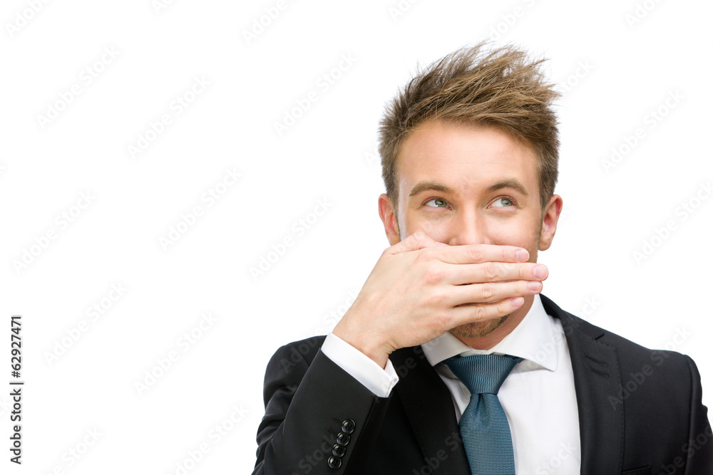 Portrait of laughing businessman who covers mouth with hand Portrait of laughing businessman who covers mouth with hand