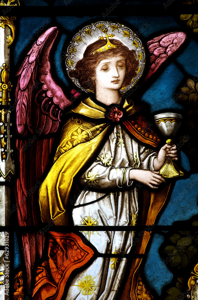 Angel holding a cup, in stained glass.