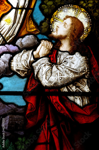 Jesus praying in stained glass