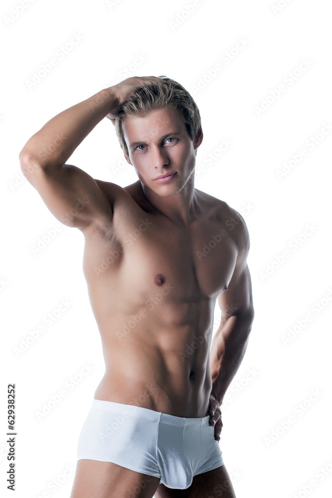 Fototapeta premium Shot of handsome muscular man advertises underwear