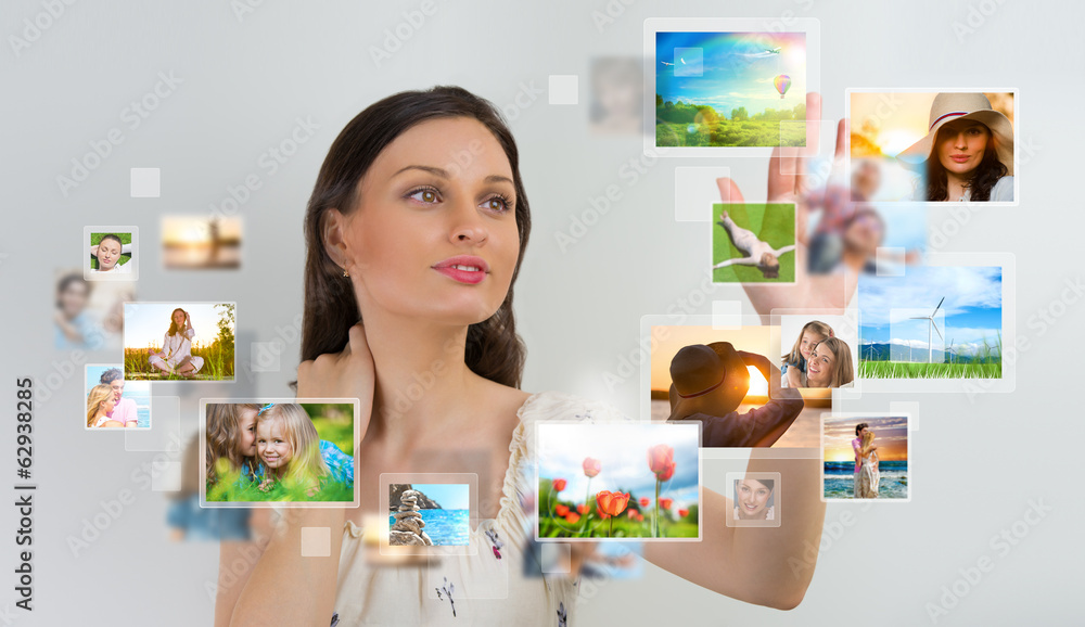 Portrait of young happy woman sharing her photo and video files Portrait of young happy woman sharing her photo and video files