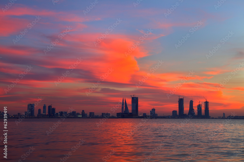 orange red sky during sunset and Bahrain skyline, HDR photograph