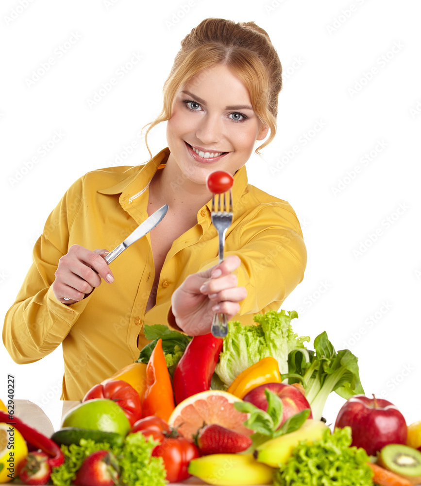 Happy young woman with vegetables and fruits. Isolated over whit Happy young woman with vegetables and fruits. Isolated over whit