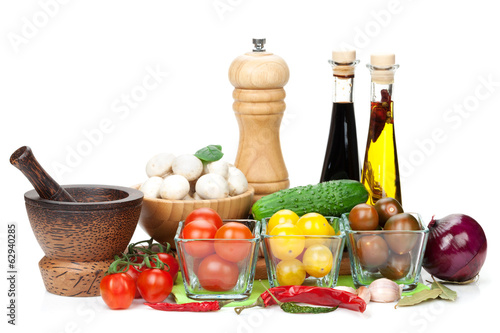 Fototapeta Naklejka Na Ścianę i Meble -  Fresh ingredients for cooking: tomato, cucumber, mushroom and sp