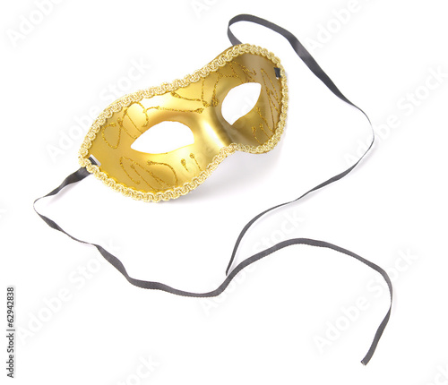 Golden carnival mask with ribbons
