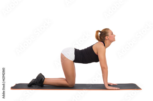 Female Stretching On Aerobic Mat Before Workout
