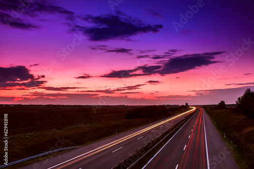 Cars speeding on a highway © Kavita