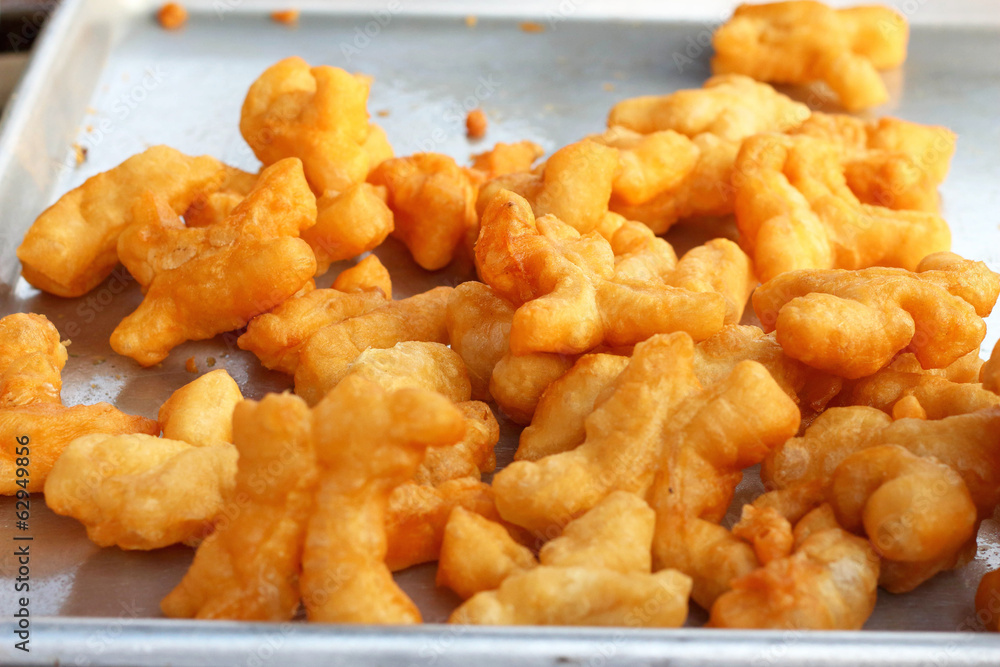 Deep-fried dough stick on the pan