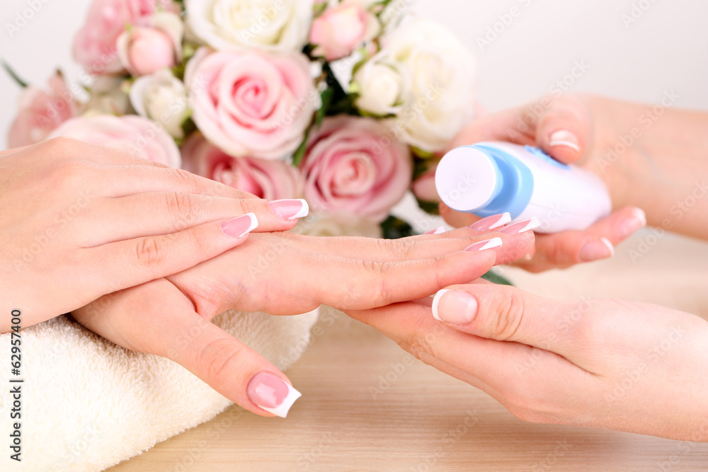 Fototapeta premium Manicure process in beauty salon close up