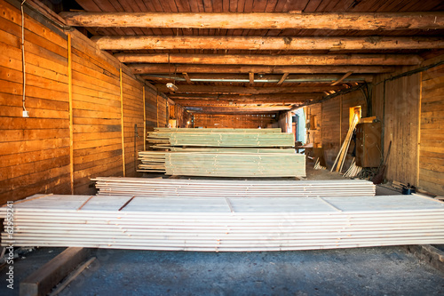 Wallpaper Mural stacks of plywood piled up in wood factory Torontodigital.ca